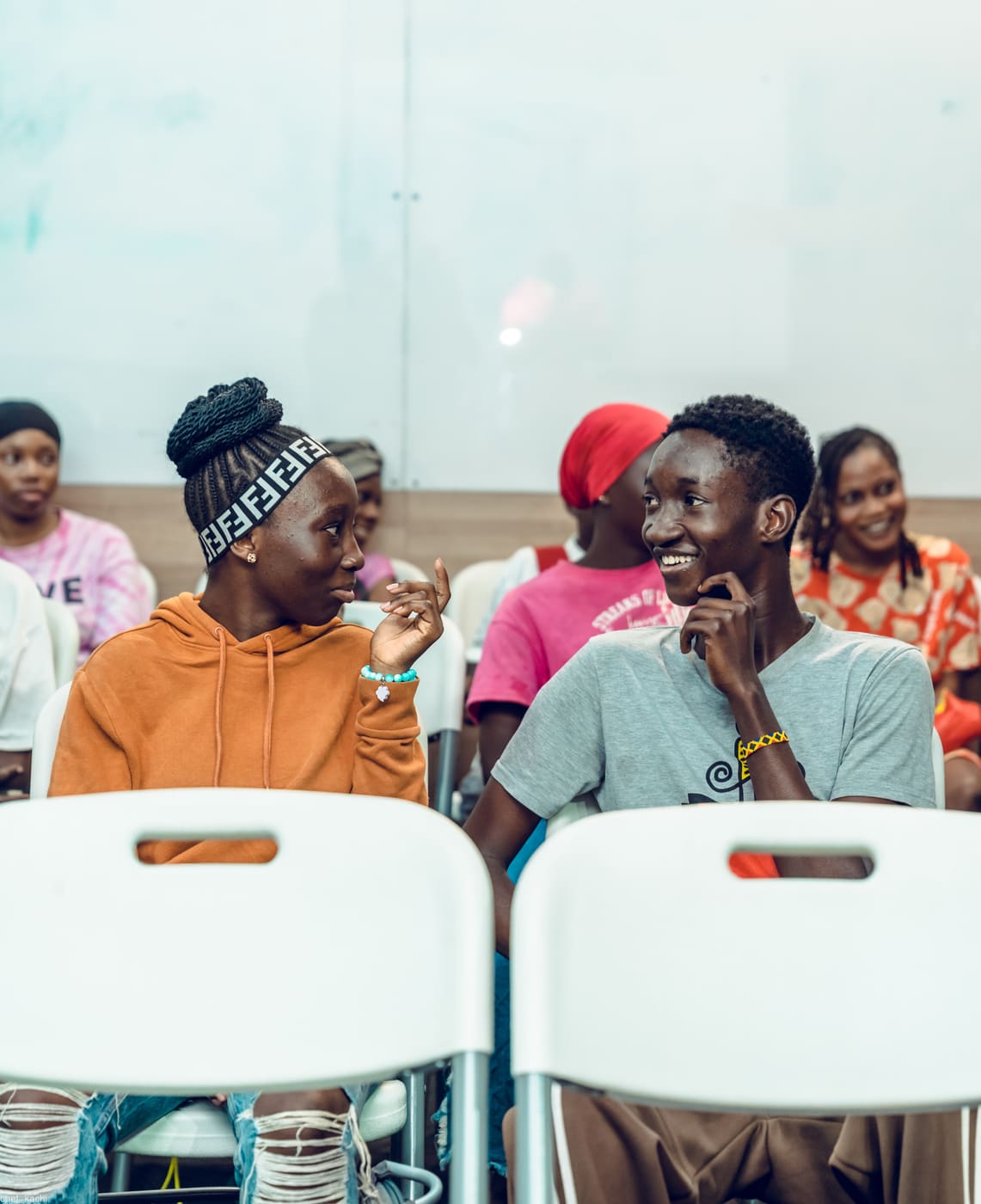 Students laughing together at demo day