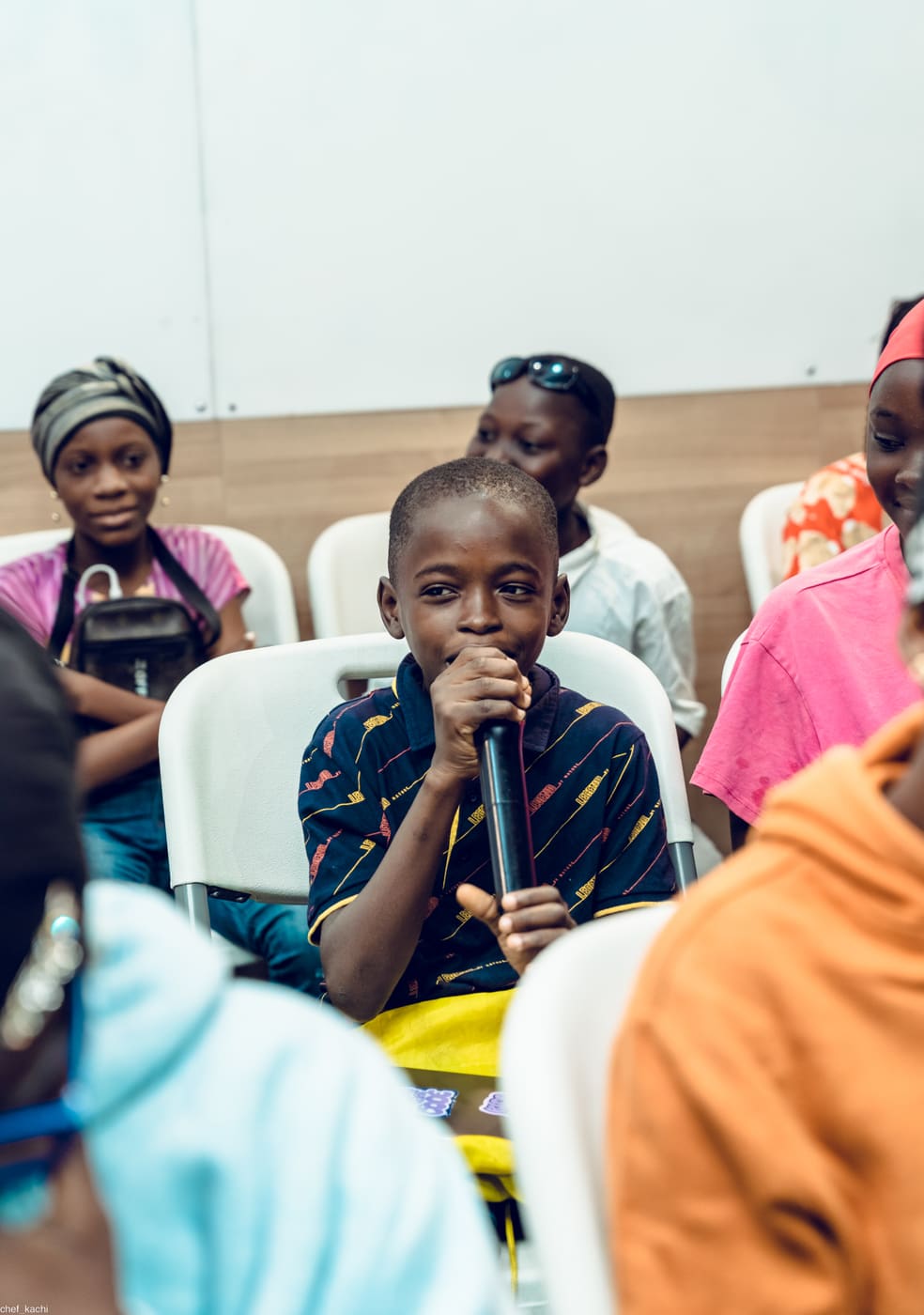 A student answering a question at demo day